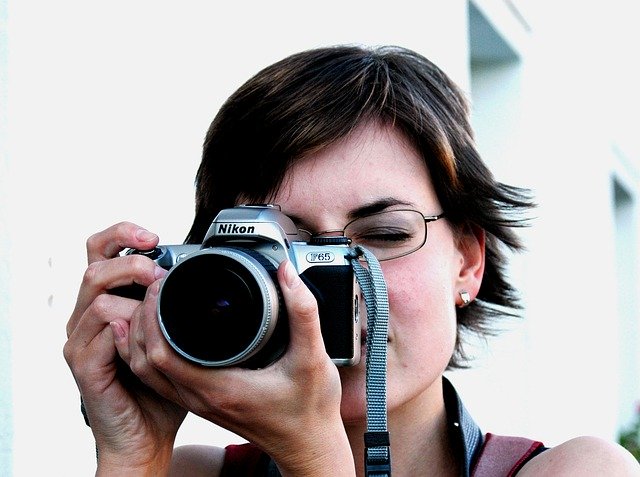 Photographer with SLR camera
